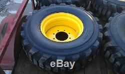 4 NEW 14x17.5 Skid Steer Tires & Rims for John Deere 14 ply rating 14-17.5